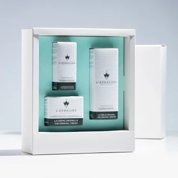 Coffret cadeau élégant L'Aubalieu avec une sélection de produits de soin de la peau.